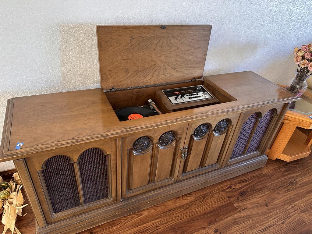 Lot 2: Vintage stereo console cabinet with record player featured in this estate finds online auction.
