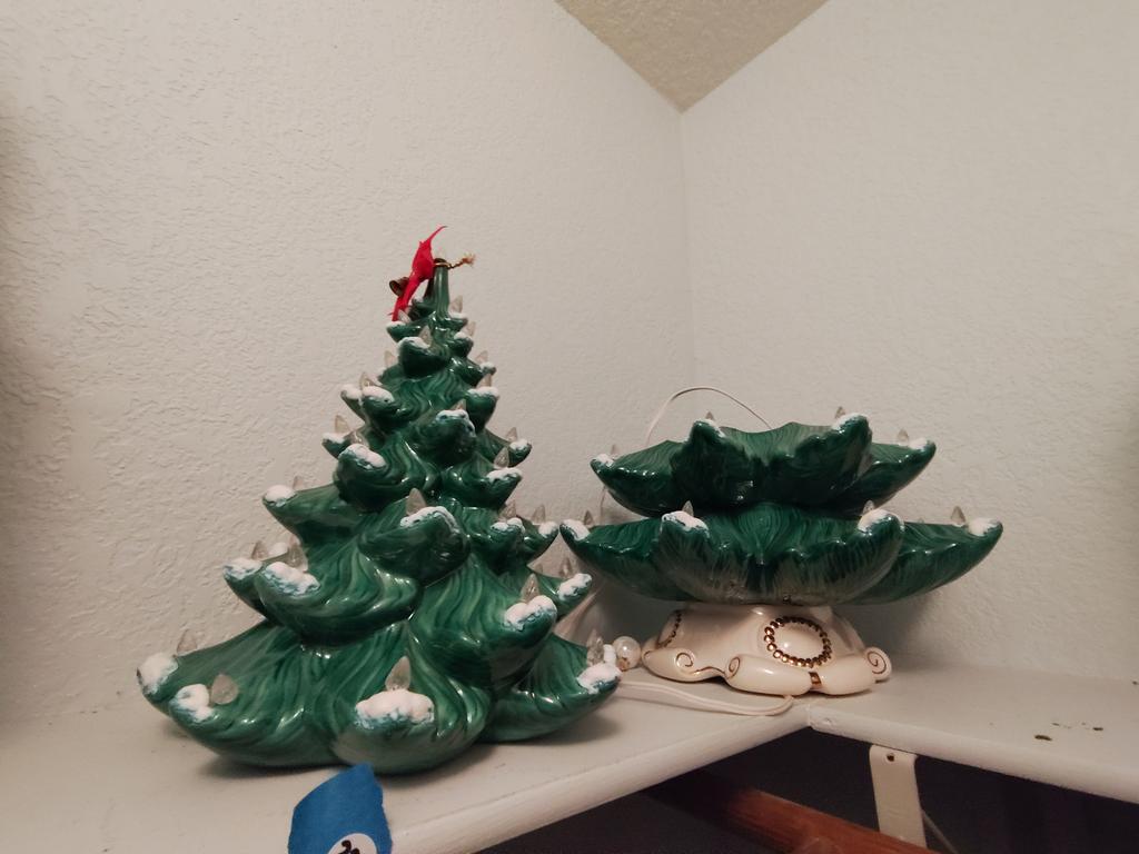 Lot 329: Vintage lighted ceramic Christmas tree from this estate finds online auction.