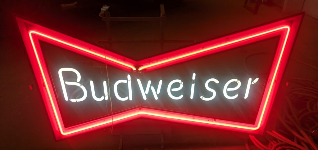 Working Budweiser neon light sign displayed in auction