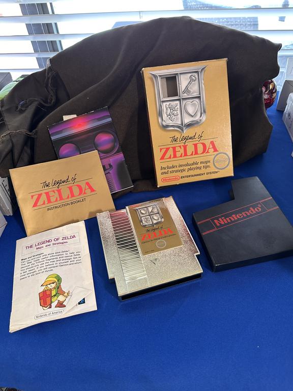 Gold Legend of Zelda NES cartridge with box and paperwork