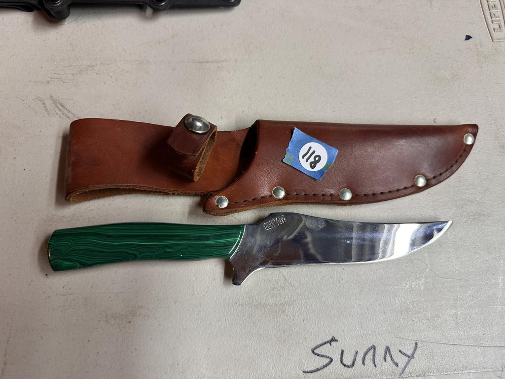 Schrade knife with green malachite handle and brown leather sheath in the Burlwood and Collectibles Auction.