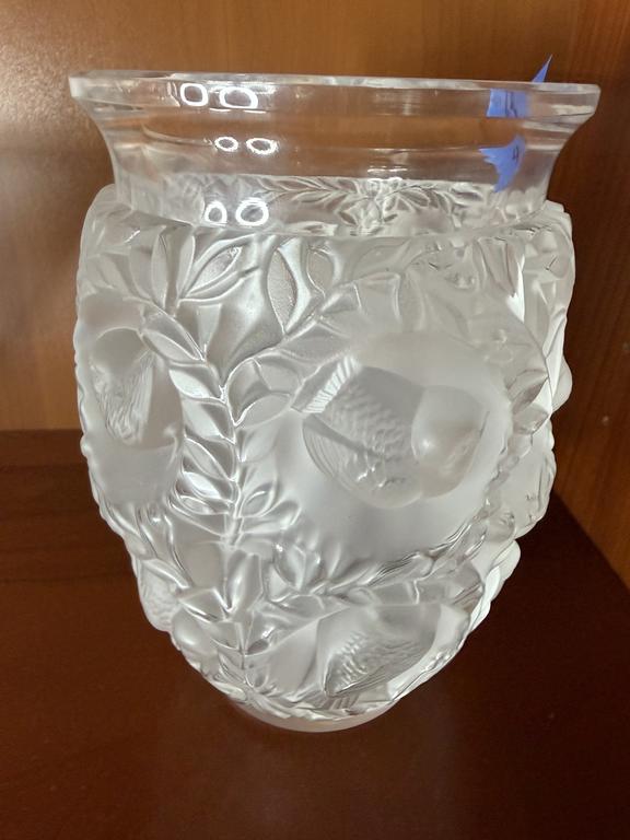 Lot 4: Lalique Bagatelle crystal vase with frosted birds and leafy relief beneath a clear rim.